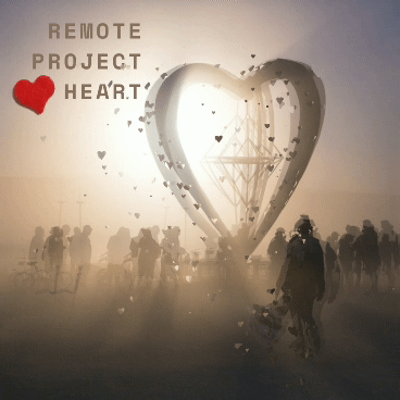 Remote Project Heart — the Burning Man heart sculpture in the dust, hearts drifting across it.